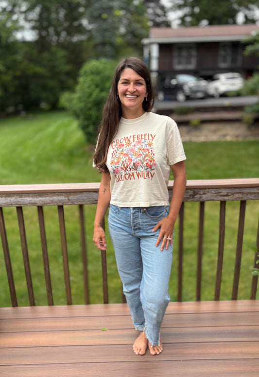 grow freely bloom wildly crop tee paired with high waisted mom jeans